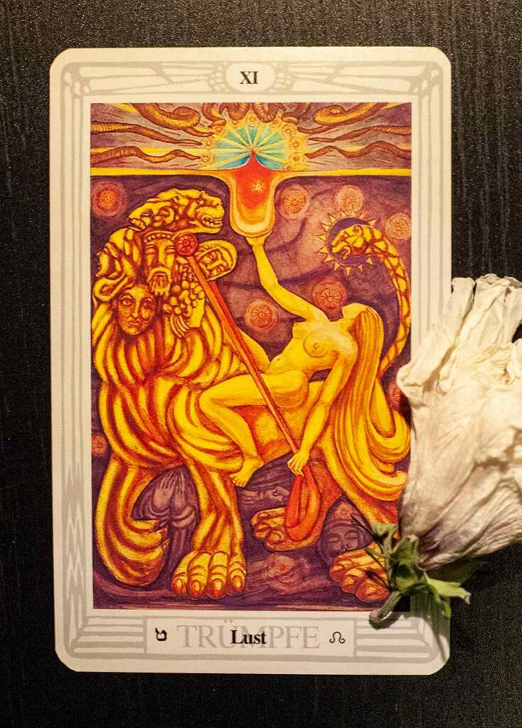 Strength (Thoth Tarot Deck)