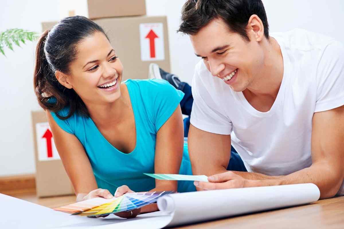 A Cancer man sitting close to a woman, engaged in warm, focused conversation