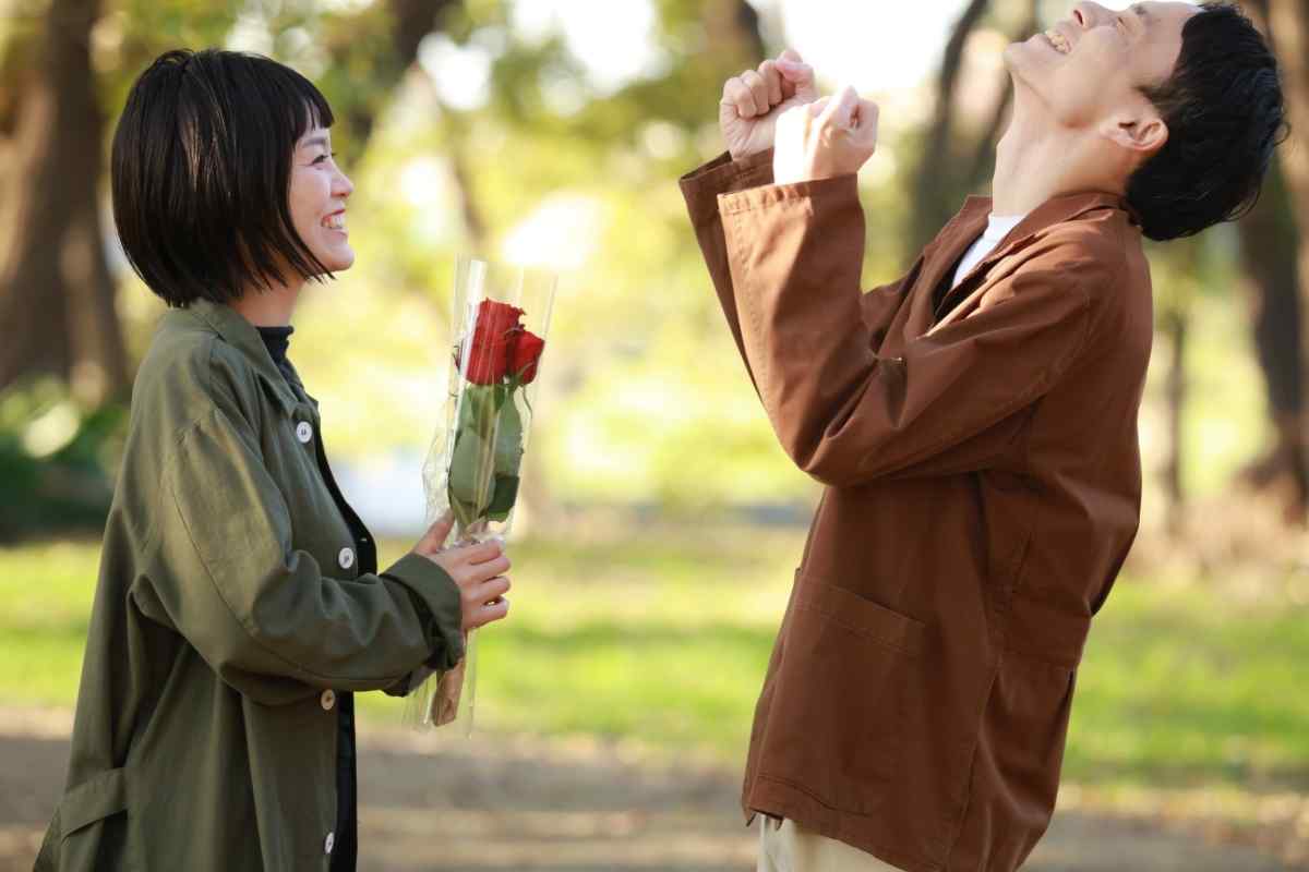 A Leo woman looking warmly and directly at someone she genuinely admires