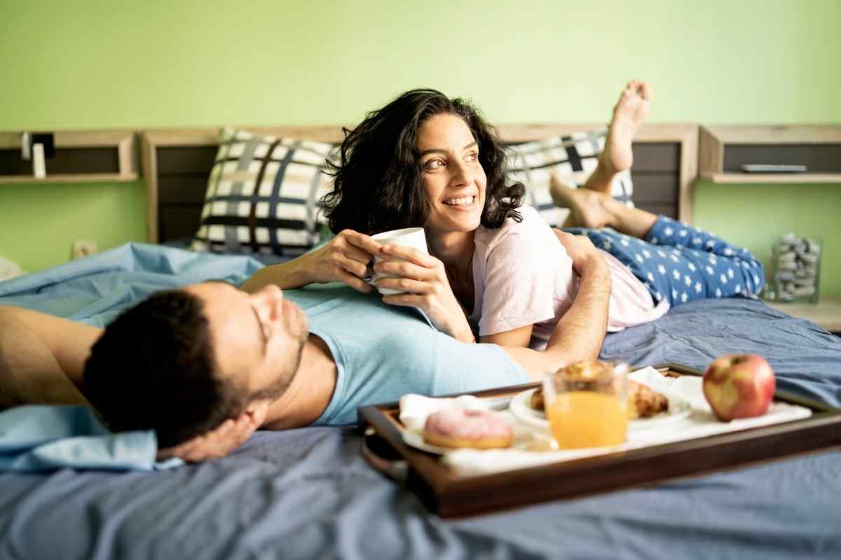 A woman who is clearly composed and self-possessed, in easy conversation with a man who is paying full attention