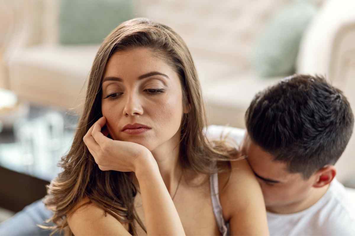 Two people at emotional distance in a shared space, no longer connecting