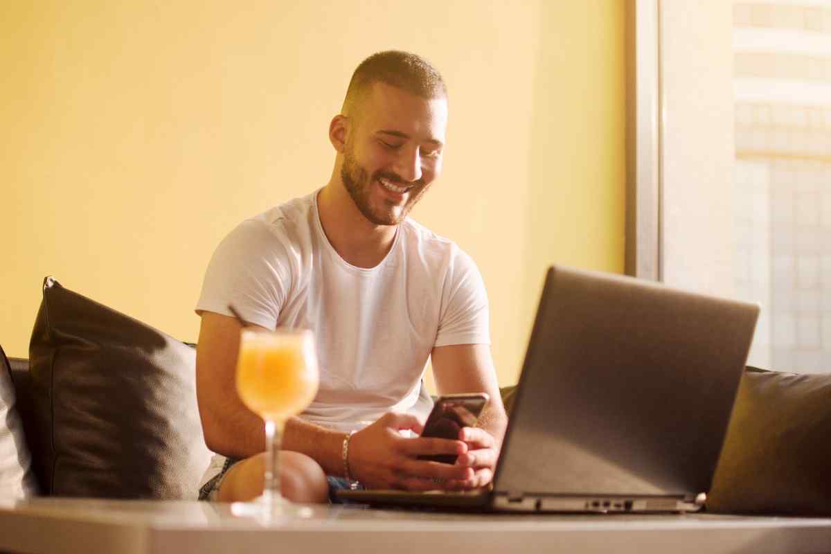 A woman and man sharing a quick, laughing moment together, the exchange easy and unguarded, capturing the playful Mercury-ruled energy that keeps a Gemini man genuinely engaged