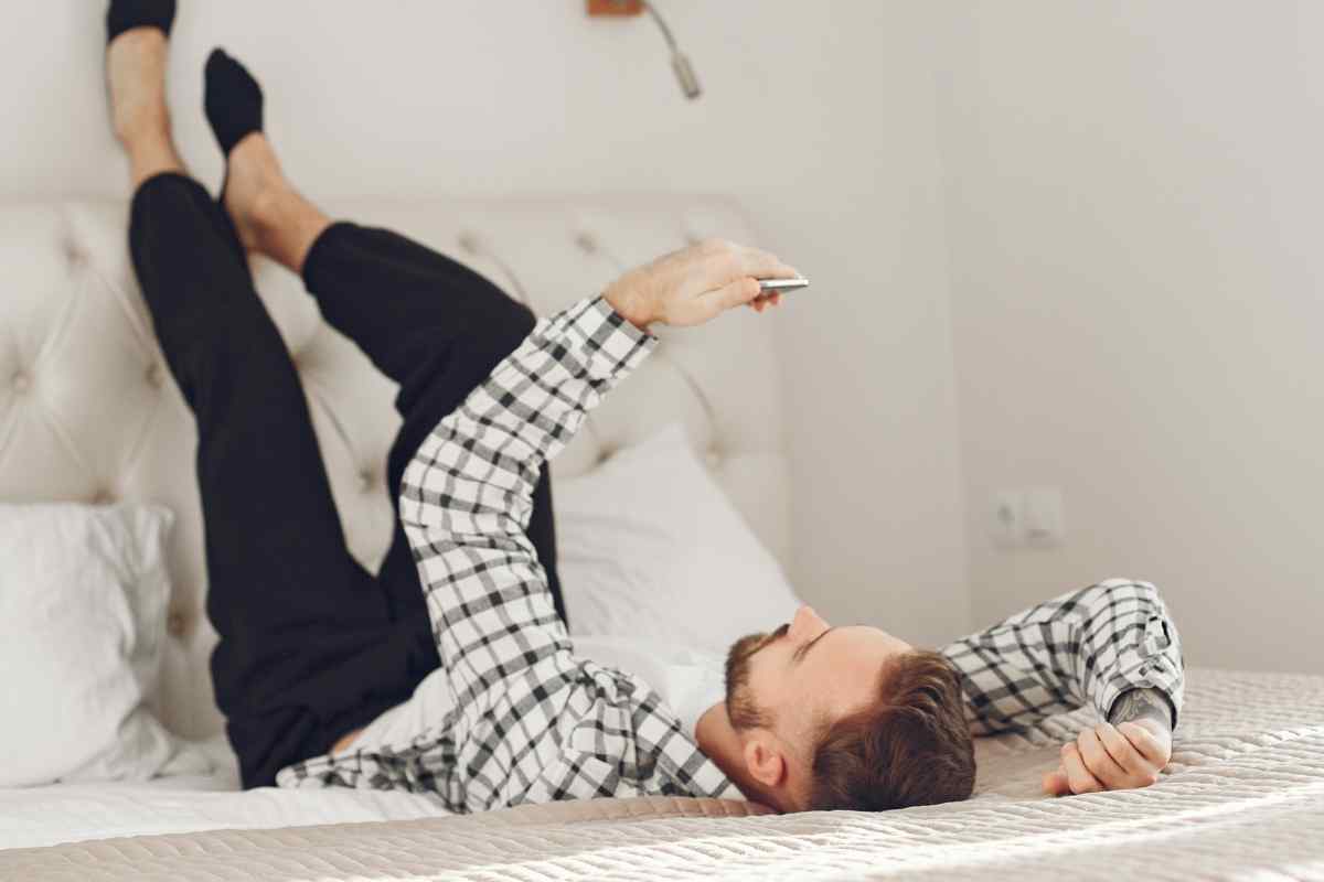 A couple in a close, expressive moment together, both warm and present, illustrating the solar energy and mutual expressiveness that makes intimacy with a Leo man feel genuinely alive rather than one-sided