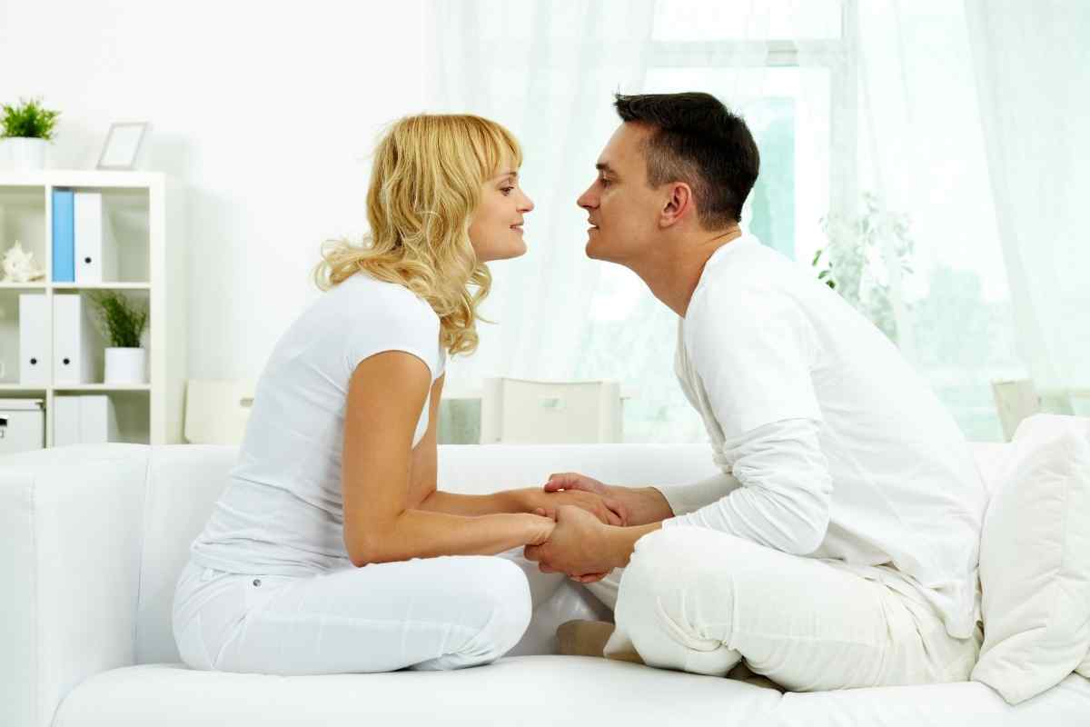 A man and woman sharing a quiet, focused moment of genuine attention and real connection
