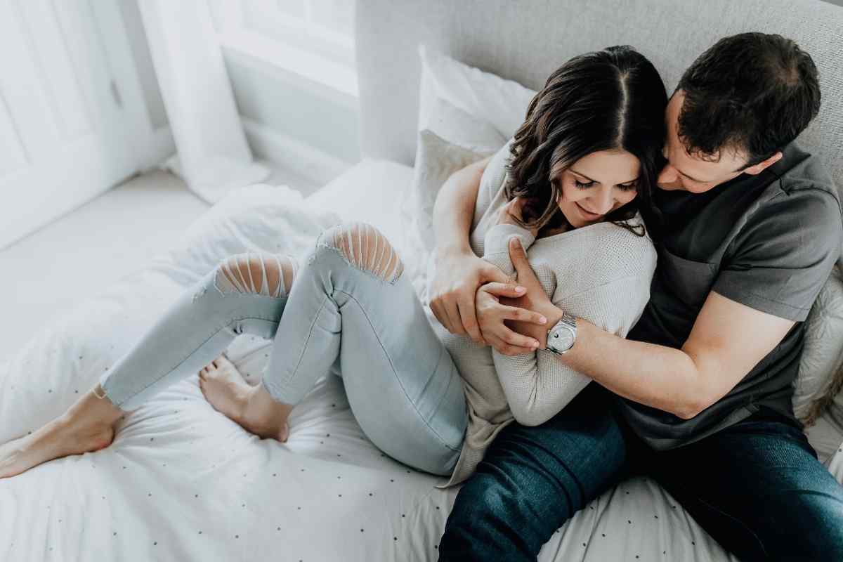 A couple in a grounded, purposeful moment together, the man steady and confident, the atmosphere composed and warm, reflecting the dynamic that works best with a Capricorn woman