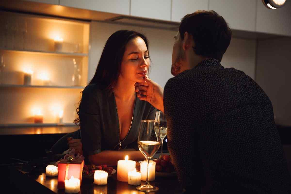 A couple working together on something meaningful, representing the Taurus woman and Aries man partnership where her groundedness meets his drive