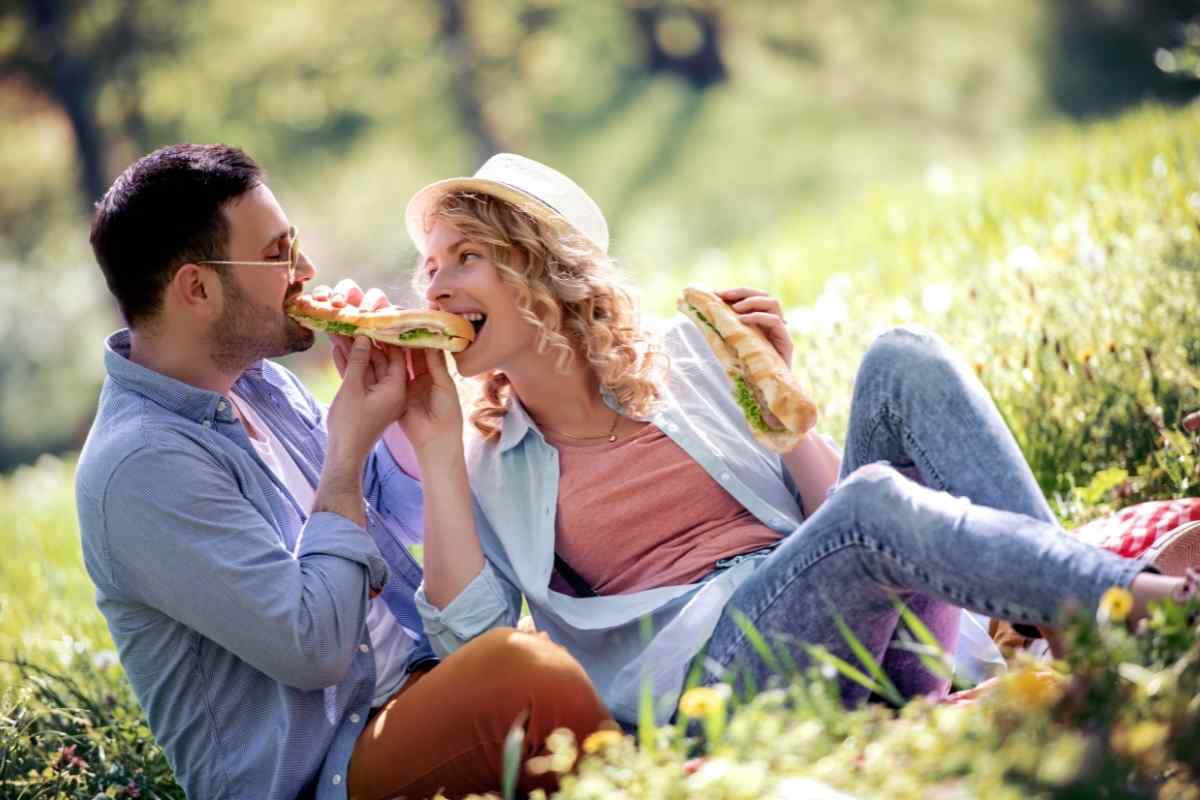 Man and woman in an animated, engaged exchange, both clearly enjoying the conversation