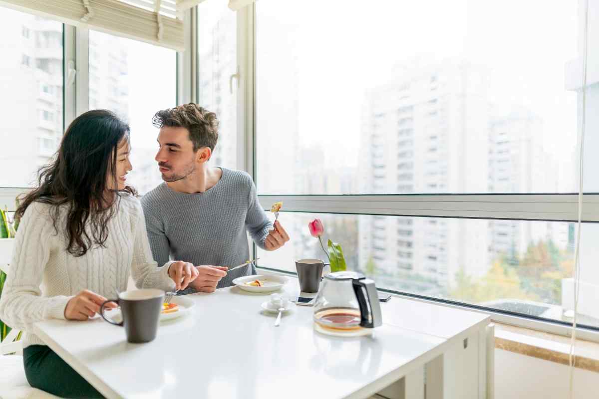 A woman setting aside what she is working on to give someone her full, unhurried attention