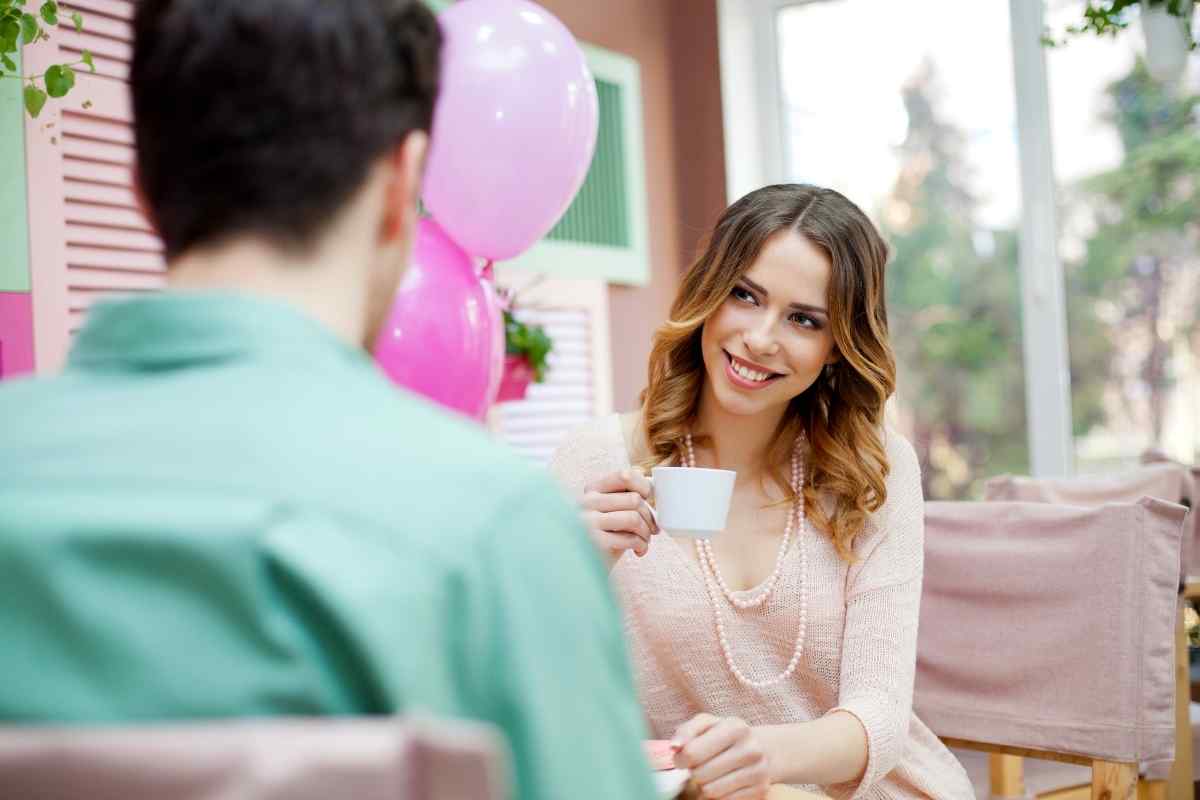 Woman looking away thoughtfully, illustrating the quiet withdrawal that signals a Libra woman has become emotionally distant in a relationship