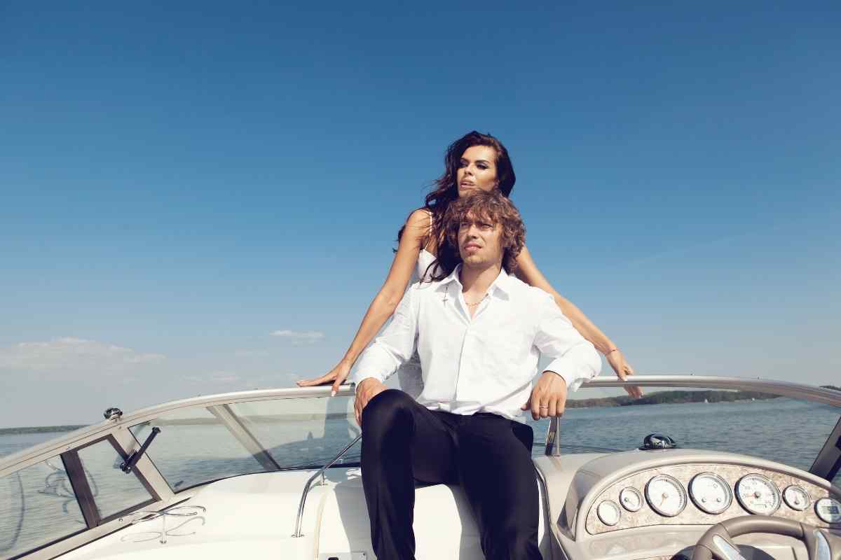 Couple sitting in silence with visible emotional distance between them, illustrating the cold withdrawal of a Scorpio man who has disengaged from a relationship