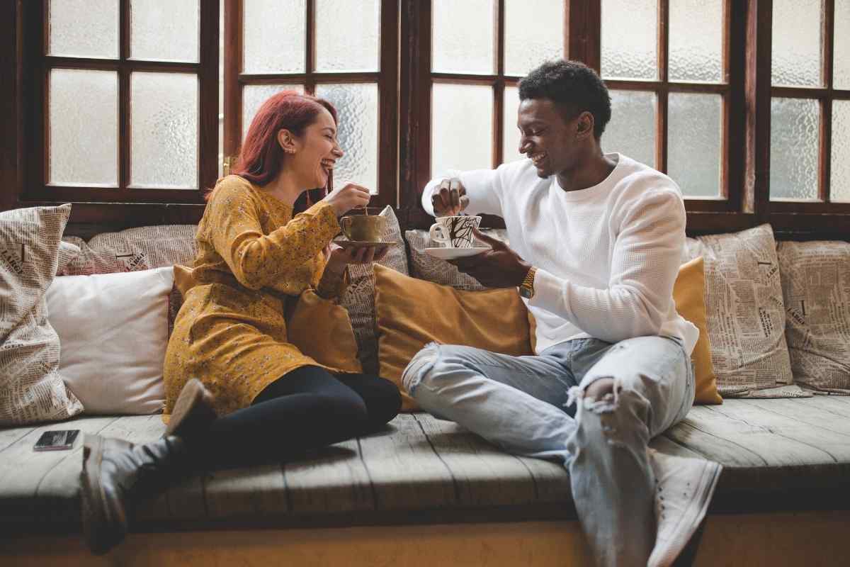 A Capricorn man quietly handling a practical task with care and competence, expressing love through action rather than words