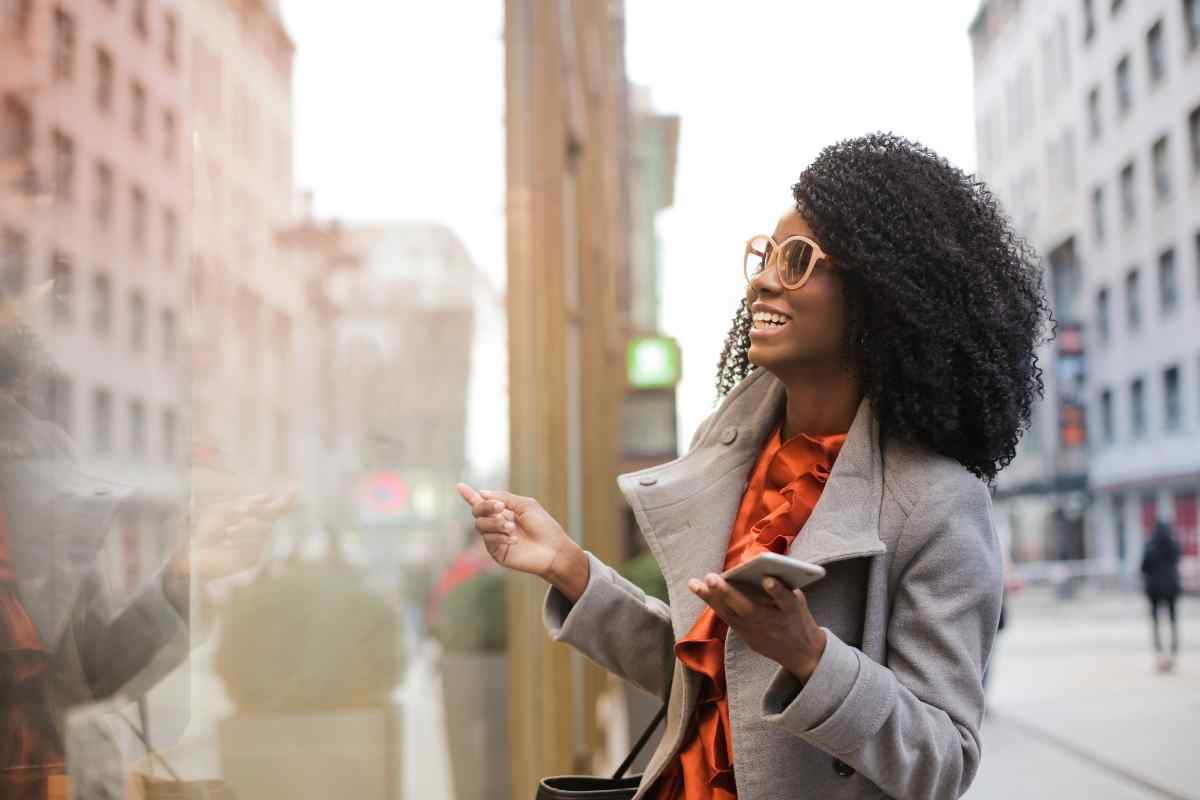A Virgo woman reading or working carefully, representing her thoughtful and precise nature