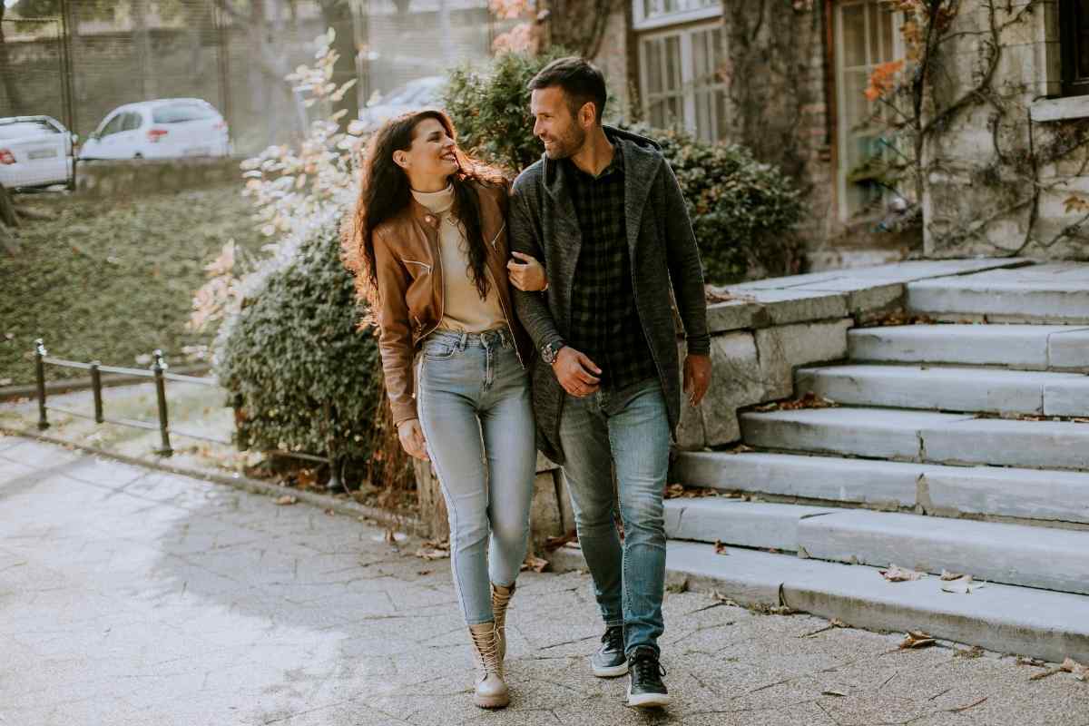 Two people working side by side with easy companionship and focus, reflecting the Virgo man and Capricorn woman's shared investment in building something real and lasting together