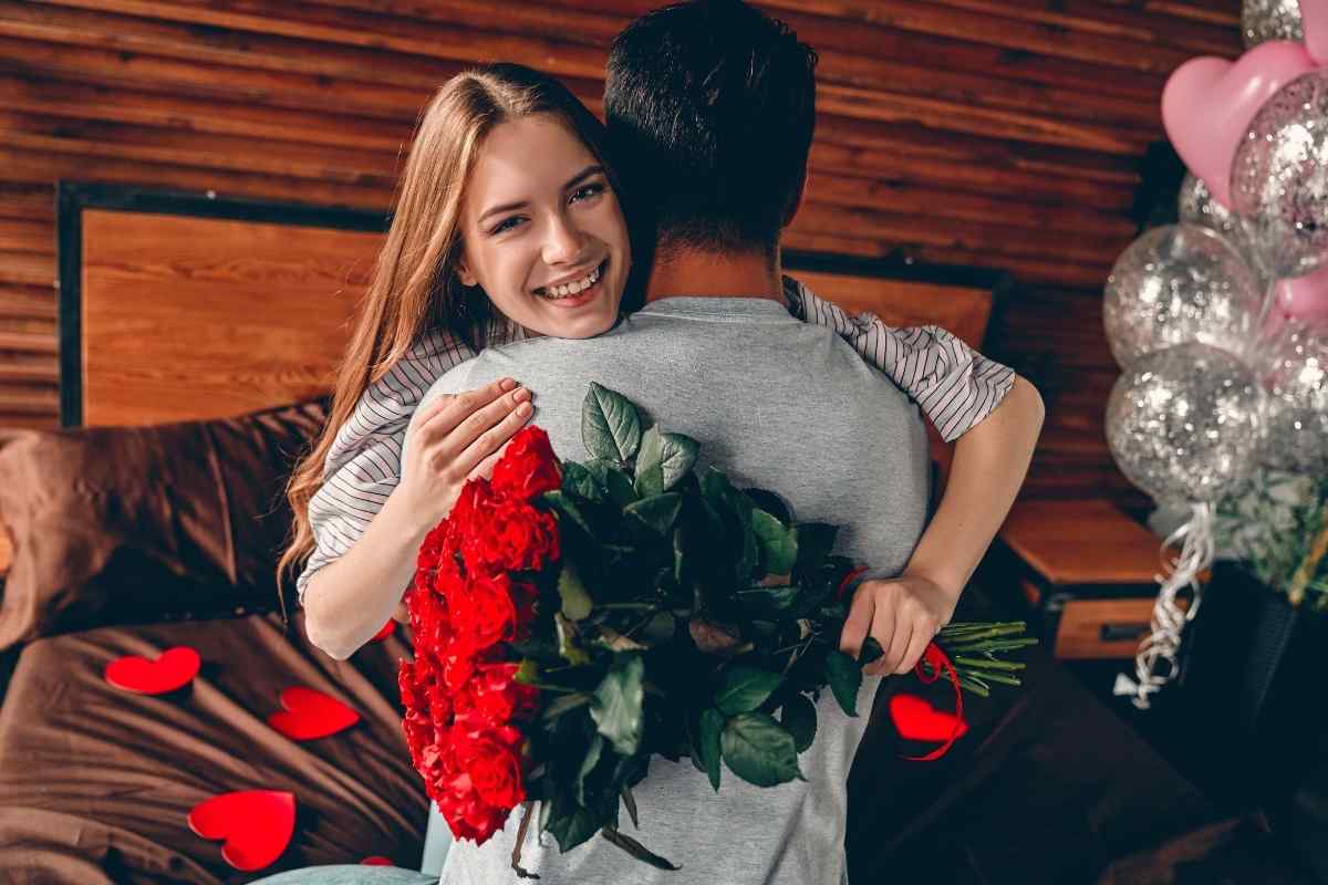 A couple in easy closeness in a comfortable home setting, reflecting the Cancer man and Virgo woman's shared investment in everyday care, warmth, and domestic life done well