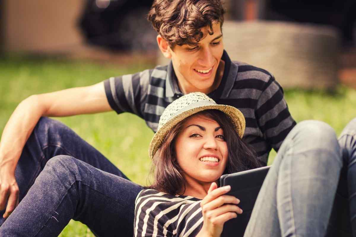 Woman warm and naturally at ease among a group of people