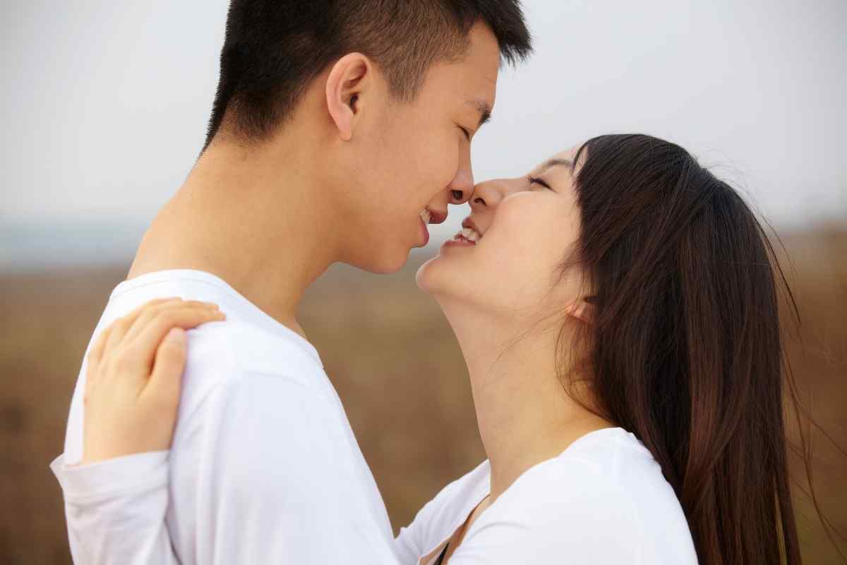 A woman actively engaged in her own pursuits with energy and focus, reflecting the vibrant self-direction that captures an Aries man's genuine attention