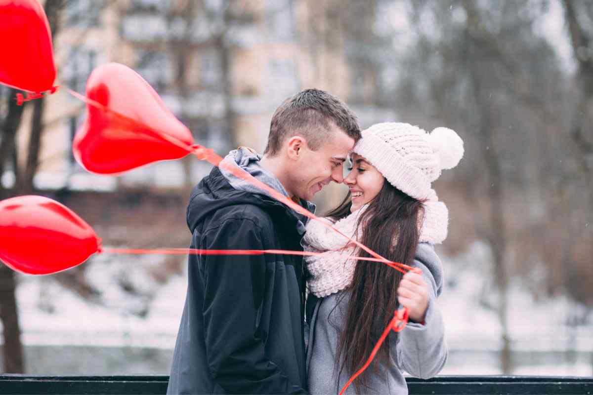 Man considering whether and how to tell a woman he is excited to see her
