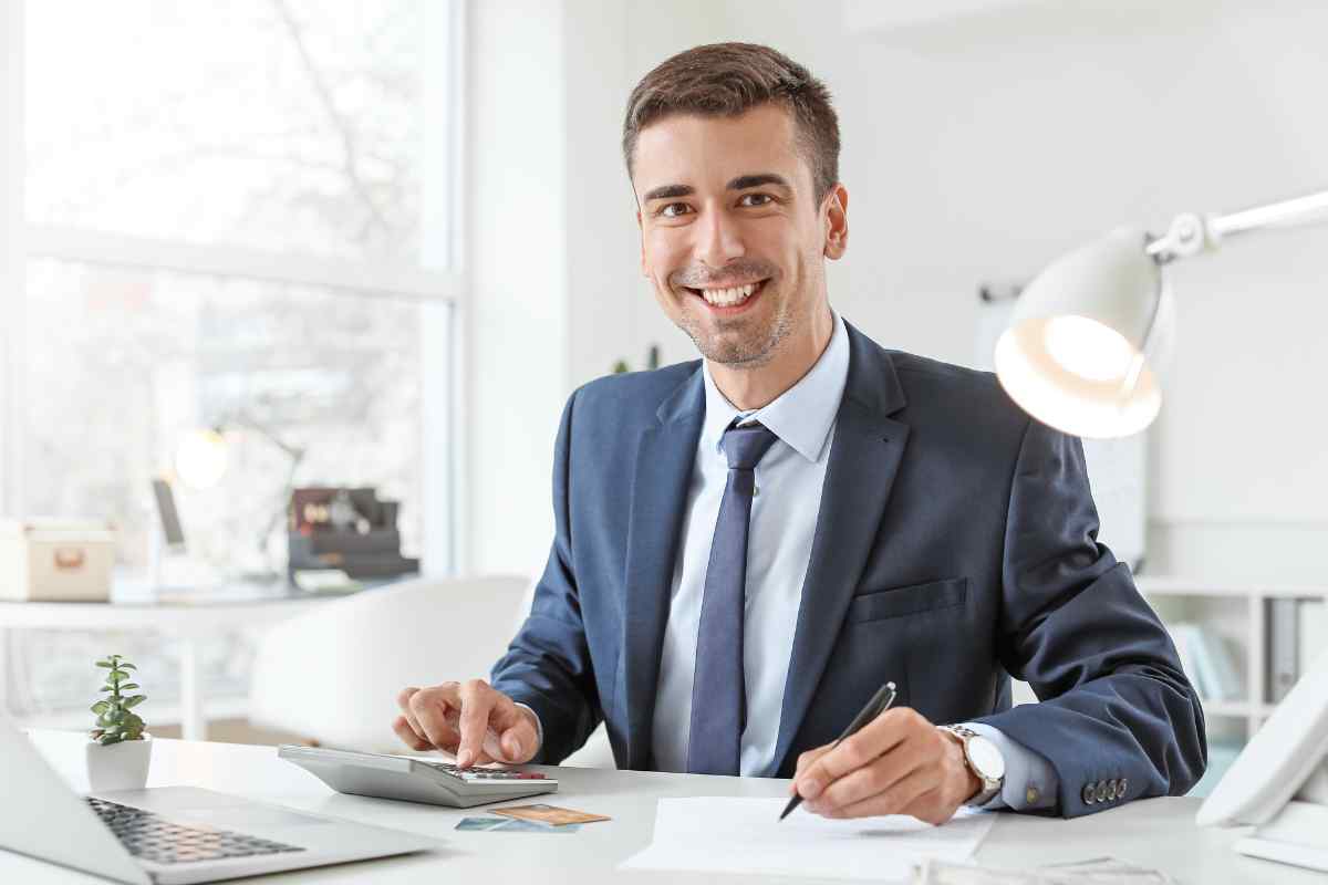 Taurus Moon professional working carefully and methodically at a clean, organized desk