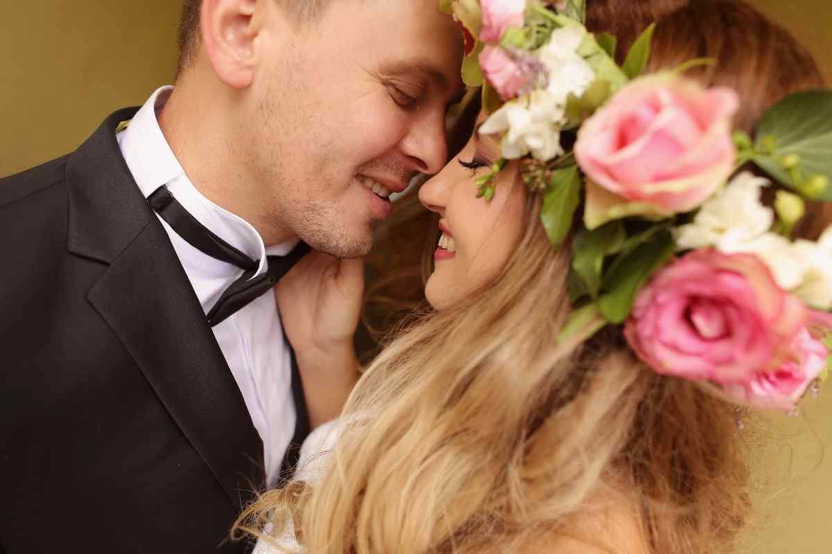 A couple sharing a tender, slow, emotionally present kiss