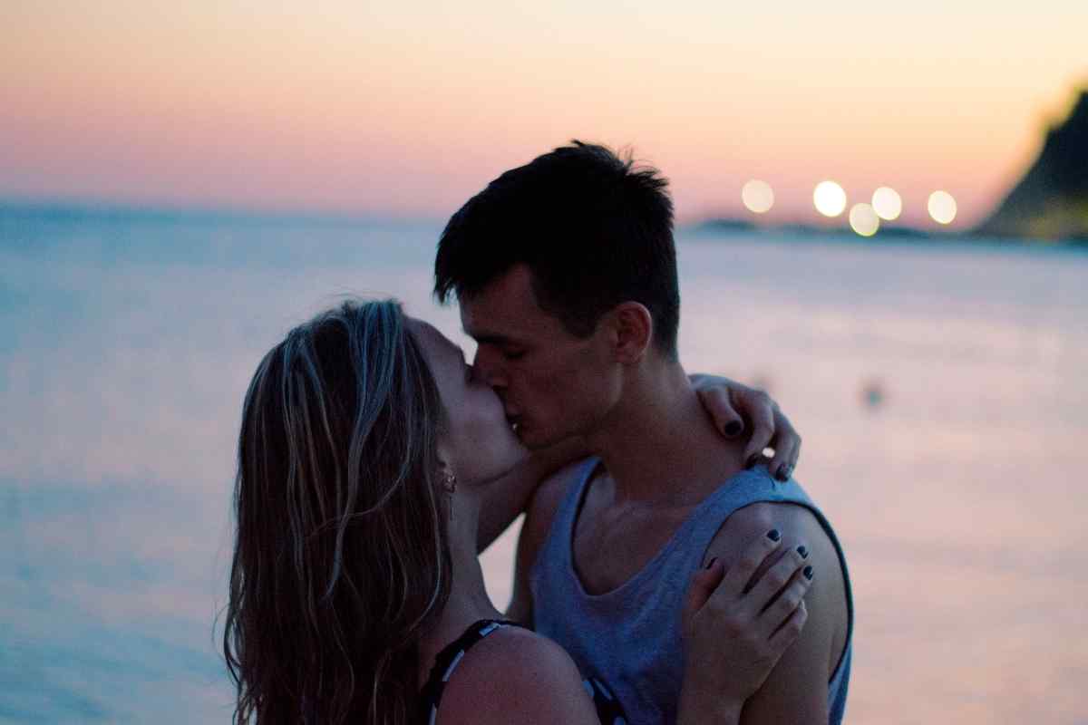 A couple relaxed and close together after a kiss, warm and unhurried