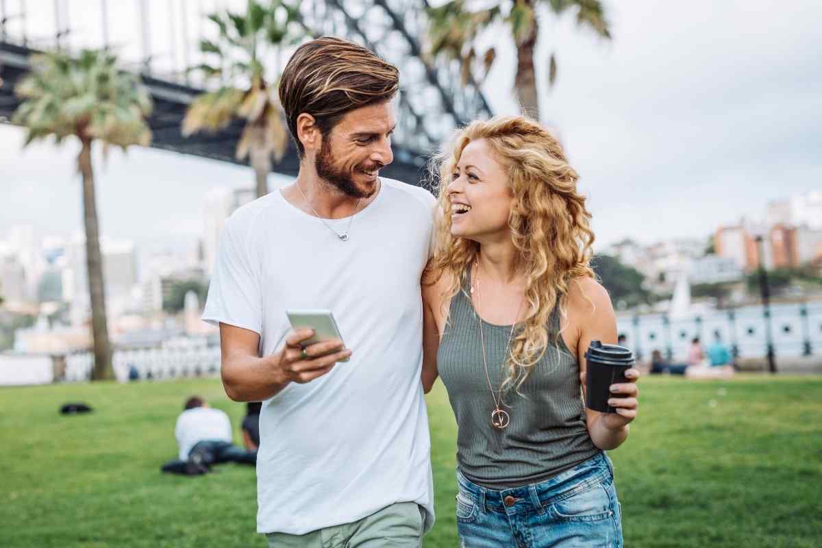 A man and woman sharing a quiet, connected moment after dinner
