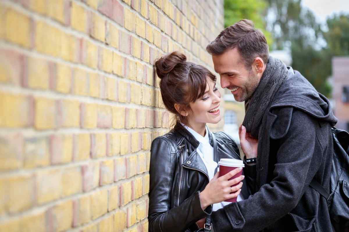 Couple on an outdoor adventure, energetic and smiling
